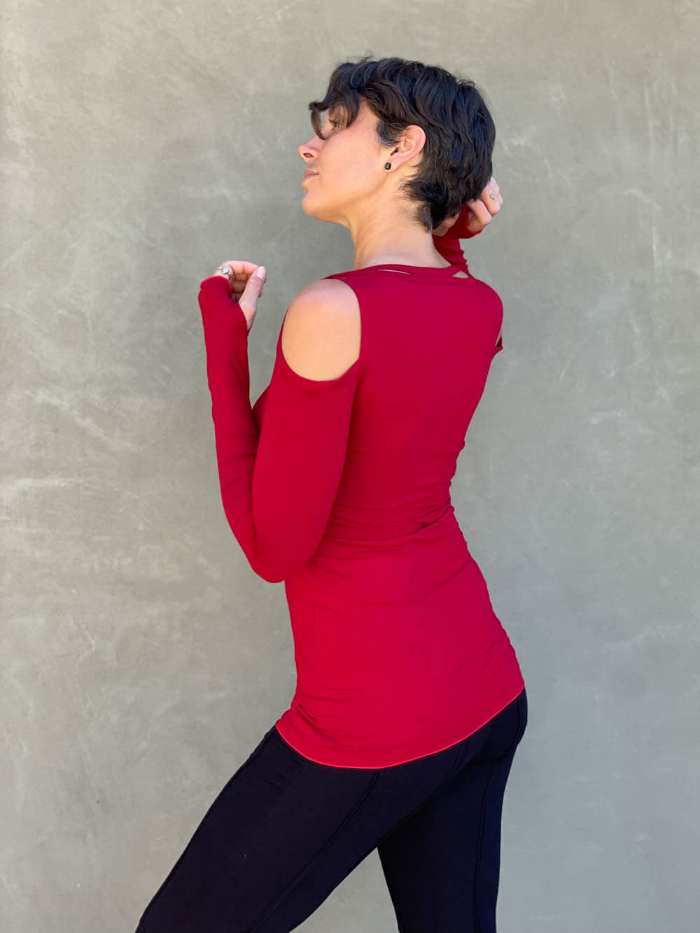 women's plant based stretchy rayon jersey long sleeve peekaboo shoulder red top with thumbholes #color_red