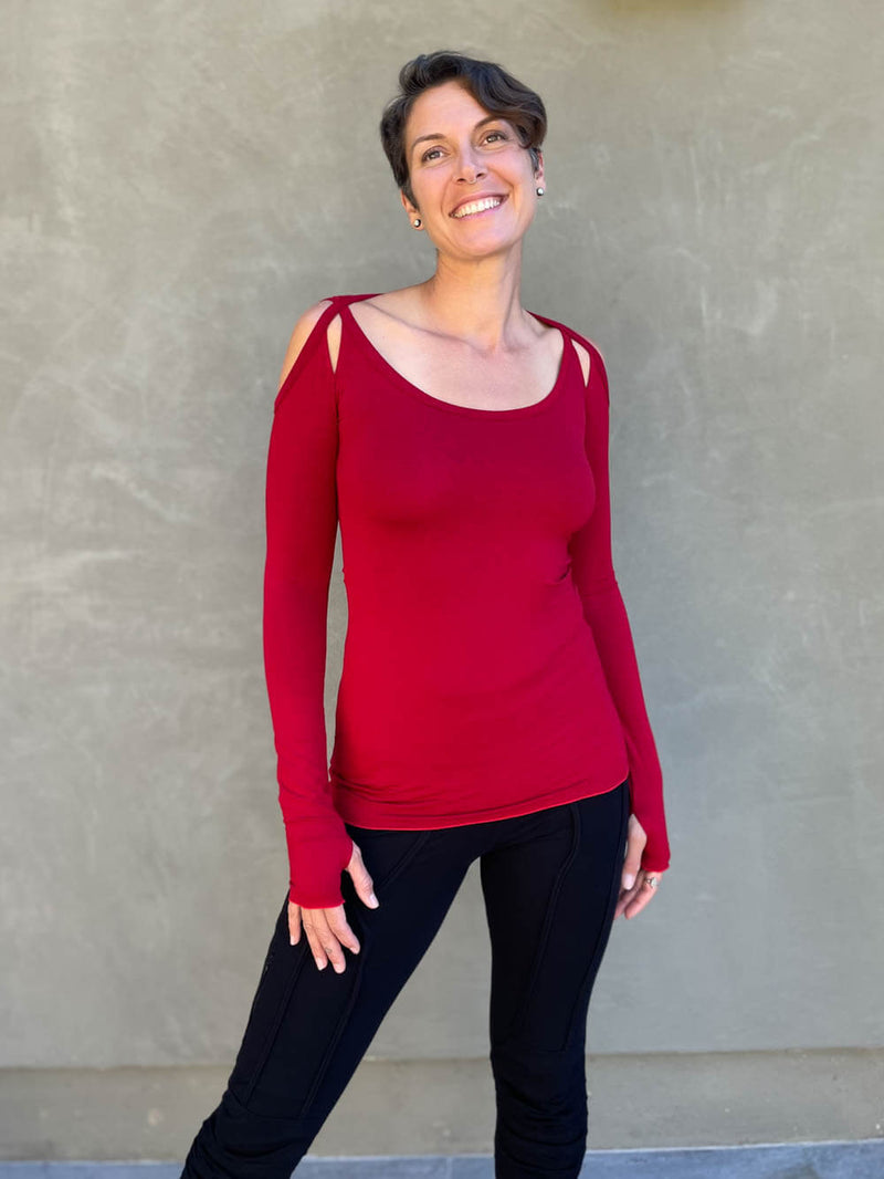 women's plant based stretchy rayon jersey long sleeve peekaboo shoulder red top with thumbholes #color_red