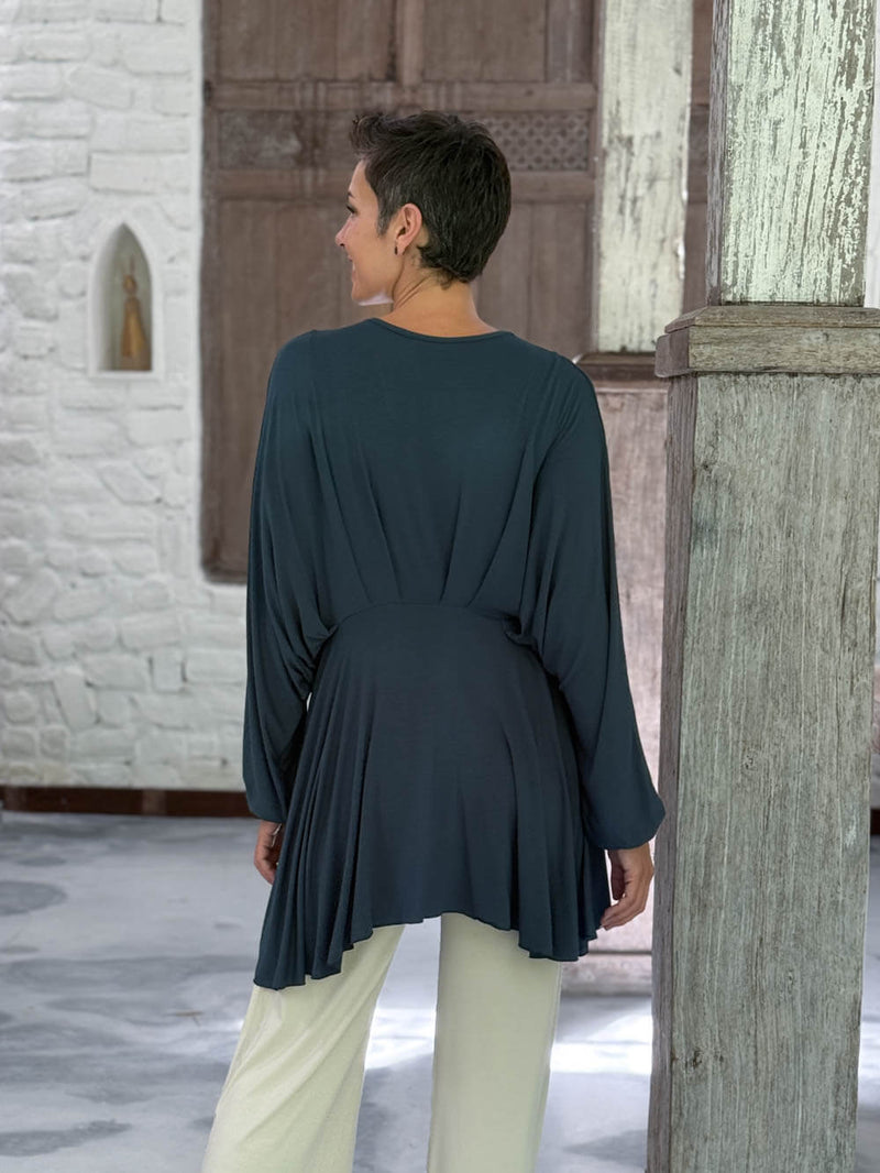 caraucci peplum tunic in teal blue lightweight rayon jersey with v neckline and asymmetrical hem #color_teal