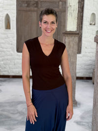CARAUCCI Racerback Top in black crafted from soft stretch rayon jersey with a V-neck and waist-length fit #color_black