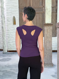 Back view of the CARAUCCI Racerback Top in purple featuring a bra-friendly racerback design #color_plum