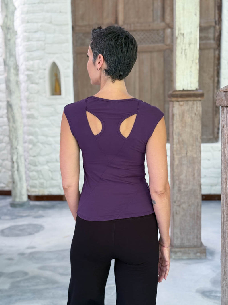 Back view of the CARAUCCI Racerback Top in purple featuring a bra-friendly racerback design #color_plum