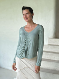 caraucci reversible sage green ruched long sleeve top #color_moss