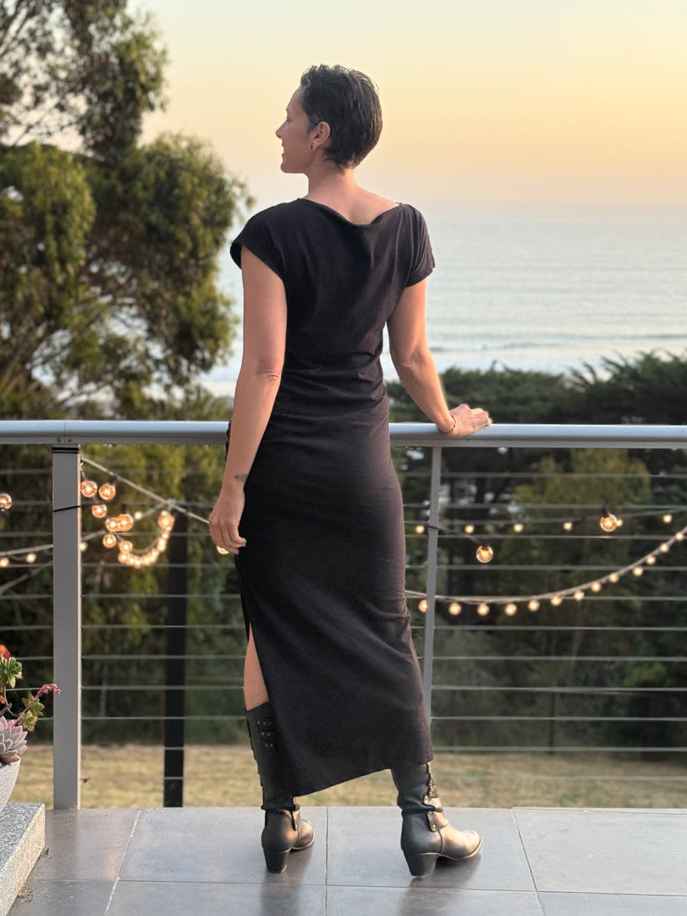 caraucci black cotton ruched midi dress with cap sleeves and side slit #color_black