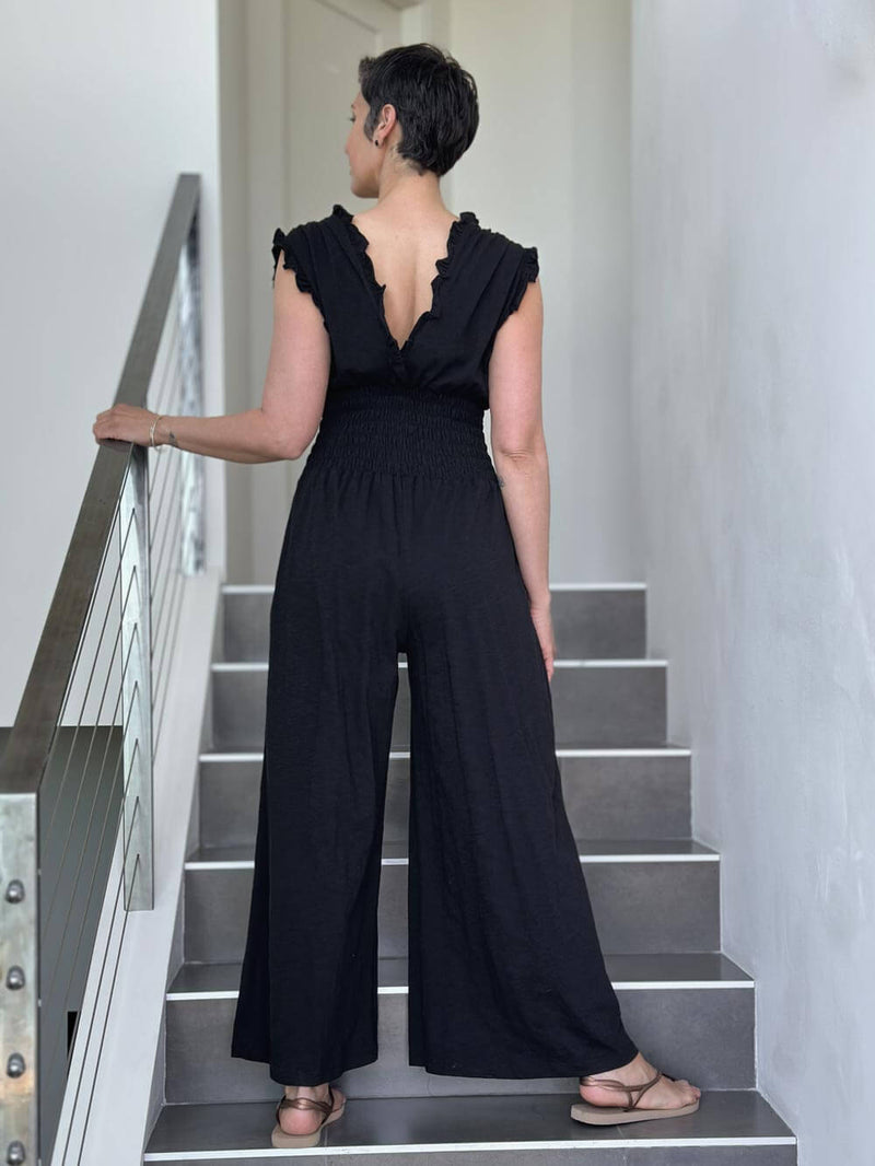  caraucci black cotton one piece ruffle pantsuit with smocked waistband #color_black