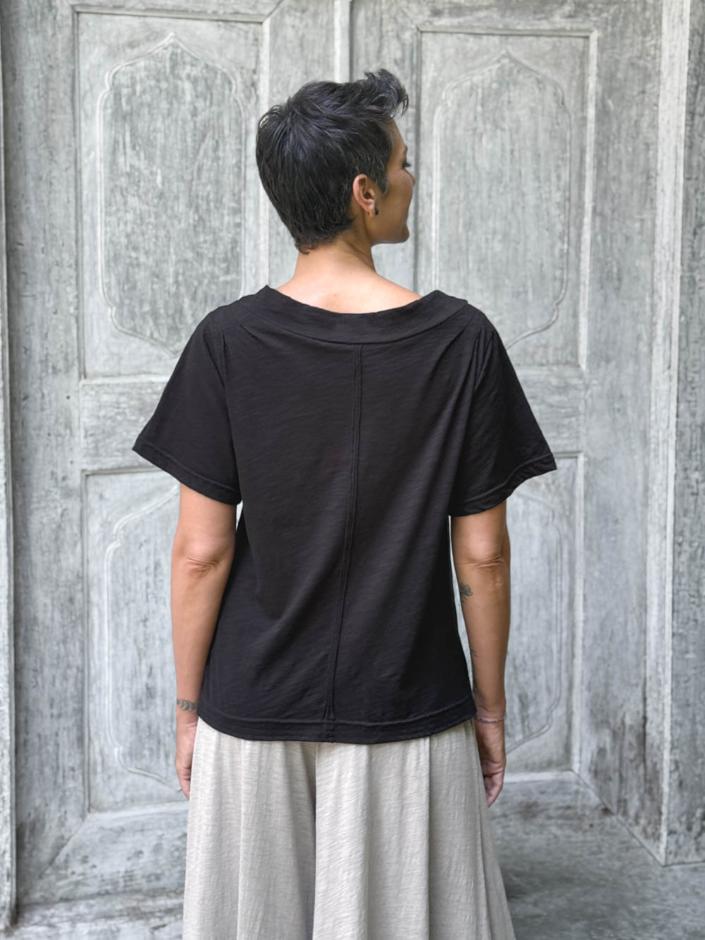 caraucci cotton black bateau tee with relaxed fit and folded neckline #color_black