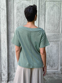 caraucci cotton soft sage green bateau tee with relaxed fit and folded neckline #color_matcha