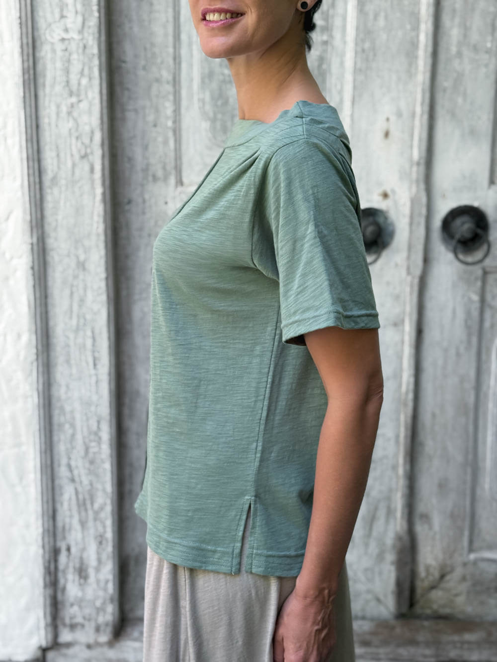 caraucci cotton soft sage green bateau tee with relaxed fit and folded neckline #color_matcha