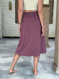 caraucci siena midi skirt in muted mauve cotton smocked waist midi skirt with pockets #color_mangosteen