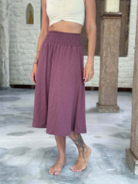 caraucci siena midi skirt in muted mauve cotton smocked waist midi skirt with pockets #color_mangosteen