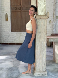 caraucci siena midi skirt in dusty ocean blue cotton smocked waist midi skirt with pockets #color_pacific