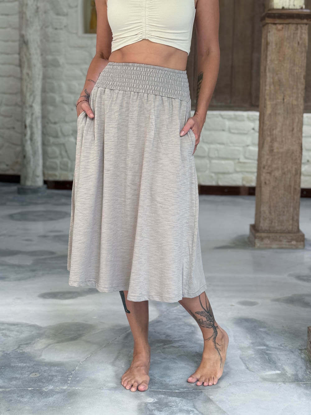 caraucci siena midi skirt in soft stone neutral cotton smocked waist midi skirt with pockets #color_sahara