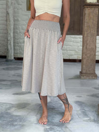 caraucci siena midi skirt in soft stone neutral cotton smocked waist midi skirt with pockets #color_sahara