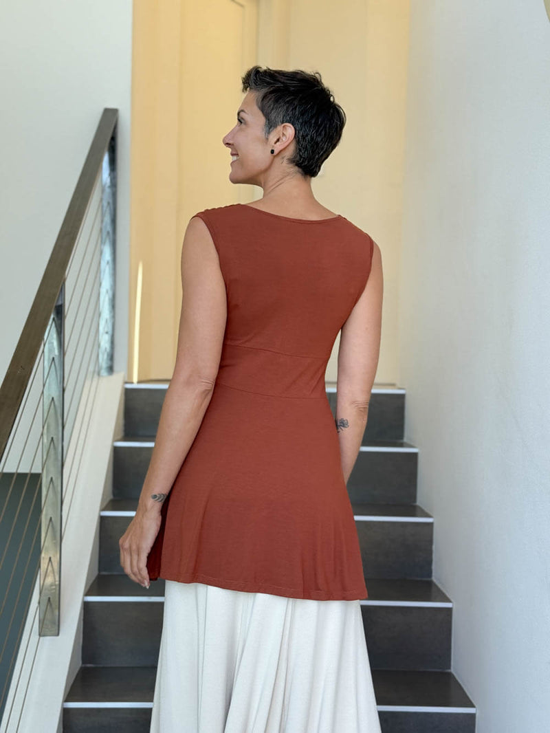 caraucci v neck sleeveless orange tunic with gathered bodice and flowing silhouette #color_copper