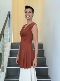 caraucci v neck sleeveless orange tunic with gathered bodice and flowing silhouette #color_copper