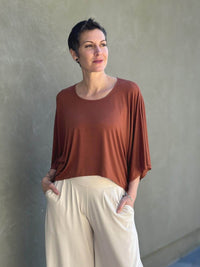 caraucci loose round neck orange dolman sleeve free size top #color_copper