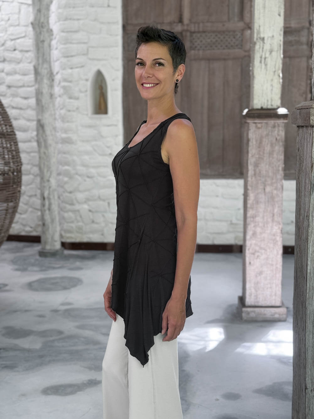 caraucci black scoop neck texture detailed tunic with cream flare joy pants  #color_black