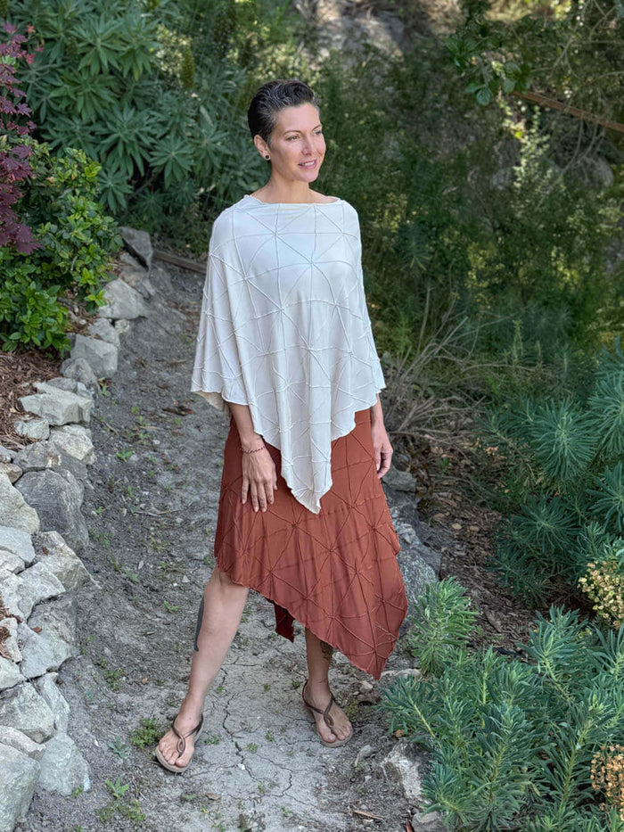 caraucci women's rayon jersey textured cream poncho can be worn multiple ways; dress, skirt, halter top #color_cream