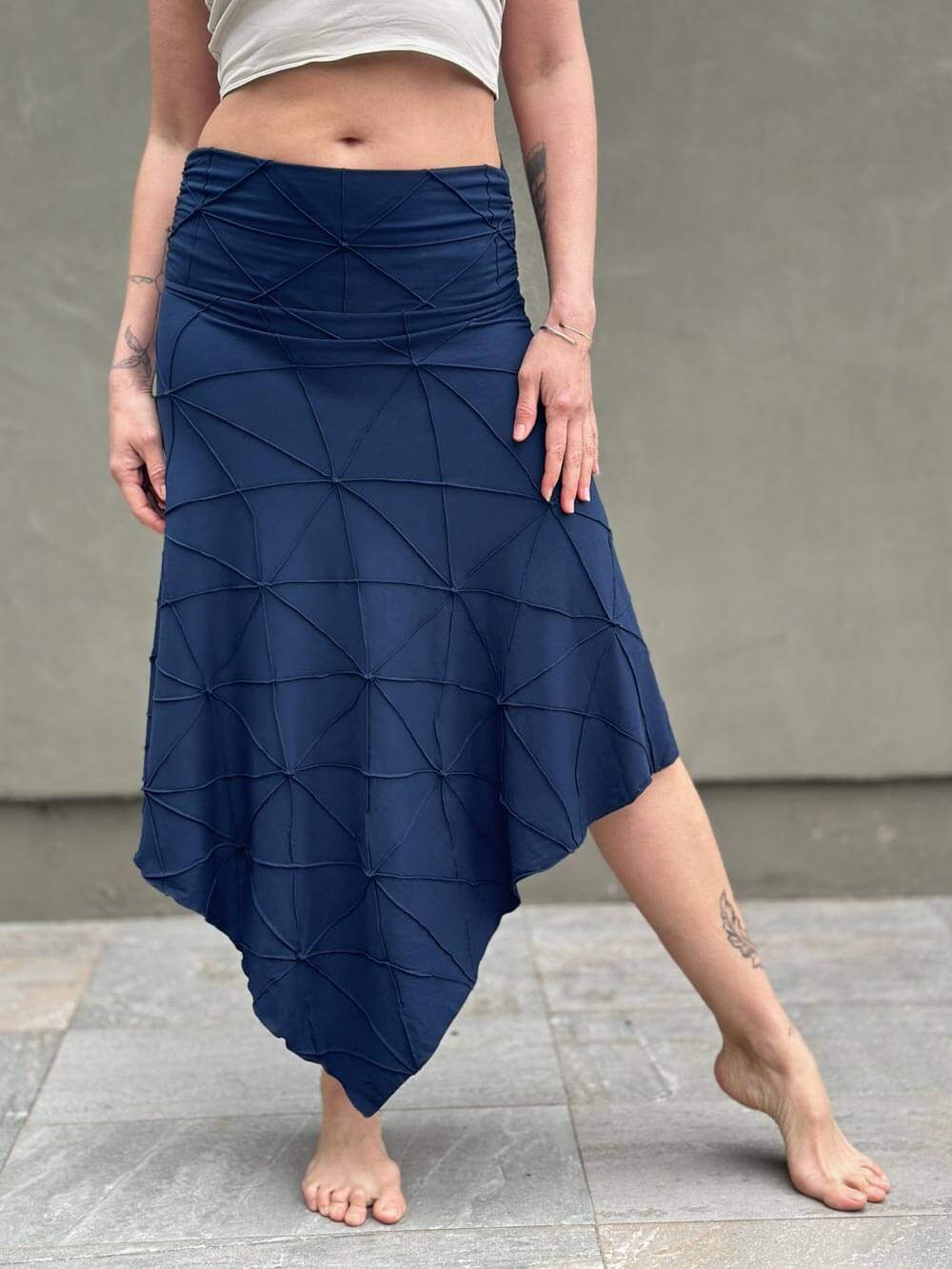 women's plant based rayon jersey stretchy asymmetrical navy midi skirt with fold-over waistband #color_navy