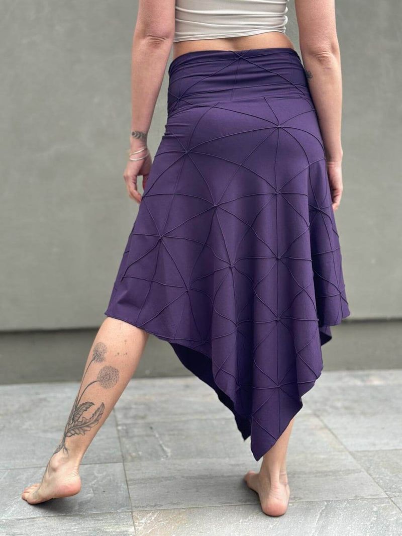 women's plant based rayon jersey stretchy asymmetrical purple midi skirt with fold-over waistband #color_plum
