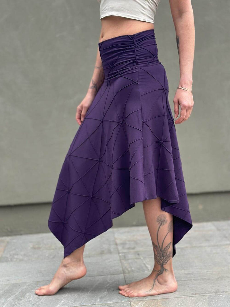 women's plant based rayon jersey stretchy asymmetrical purple midi skirt with fold-over waistband #color_plum