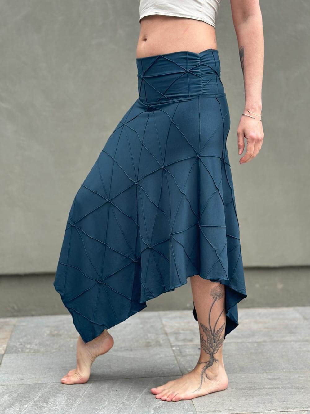 women's plant based rayon jersey stretchy asymmetrical teal blue midi skirt with fold-over waistband #color_teal