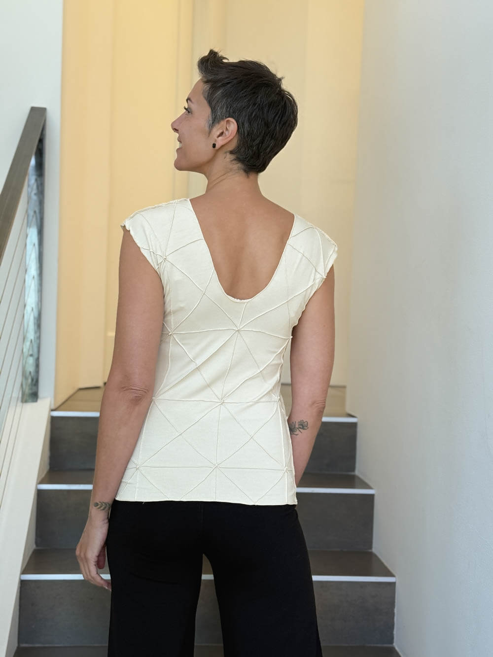 caraucci fitted cap sleeve cream top with geometric stitched texture details #color_cream