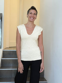 caraucci fitted cap sleeve cream top with geometric stitched texture details #color_cream