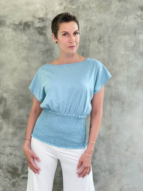 women's lightweight aqua blue cotton jersey top with smocked waist band and cap sleeves #color_aqua