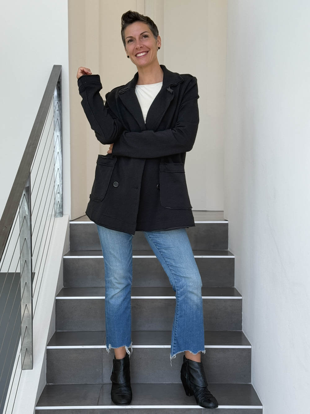 CARAUCCI Urban Lounge unstructured double-breasted black Bamboo Fleece jacket shown with jeans #color_black