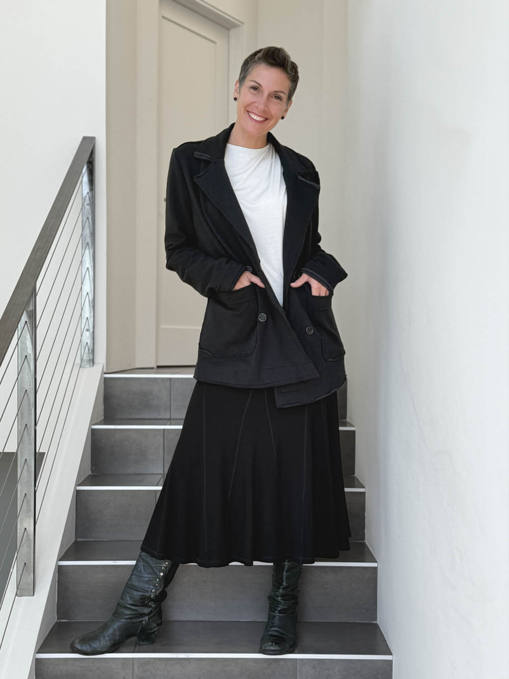 CARAUCCI Urban Lounge unstructured double-breasted black Bamboo Fleece jacket shown with black skirt #color_black