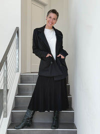 CARAUCCI Urban Lounge unstructured double-breasted black Bamboo Fleece jacket shown with black skirt #color_black