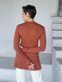 caraucci v-neck long sleeve orange tunic with thumbholes #color_copper