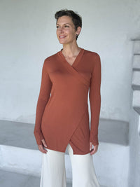 caraucci v-neck long sleeve orange tunic with thumbholes #color_copper