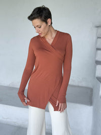caraucci v-neck long sleeve orange tunic with thumbholes #color_copper