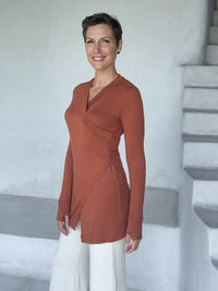 caraucci v-neck long sleeve orange tunic with thumbholes #color_copper