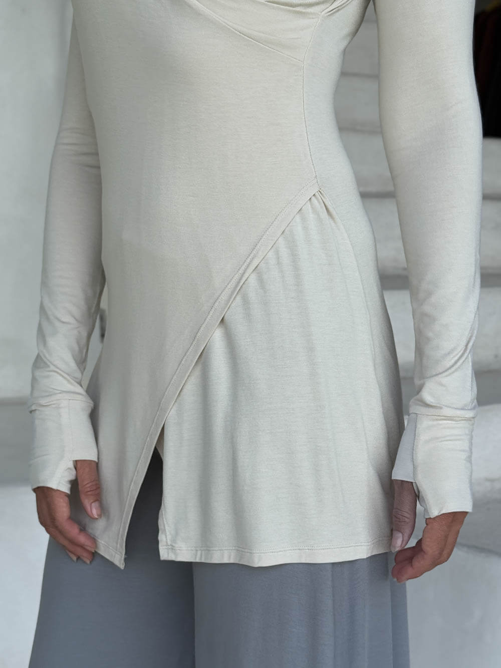 caraucci v-neck long sleeve cream tunic with thumbholes #color_cream