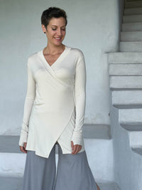 caraucci v-neck long sleeve cream tunic with thumbholes #color_cream