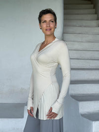 caraucci v-neck long sleeve cream tunic with thumbholes #color_cream