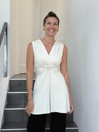 caraucci v neck sleeveless cream tunic with gathered bodice and flowing silhouette #color_cream
