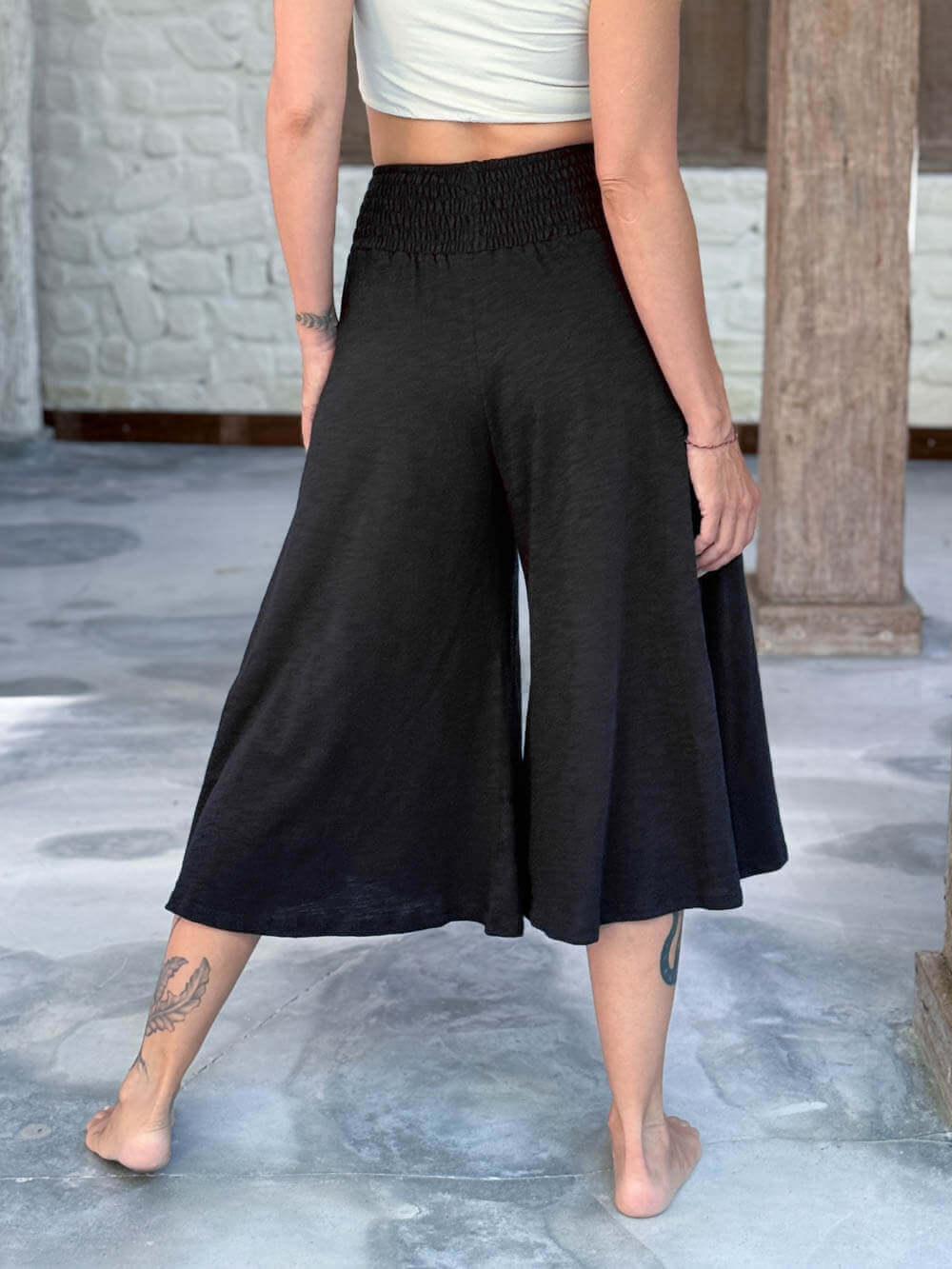 caraucci wide leg flare black cotton culotte pants with pockets #color_black