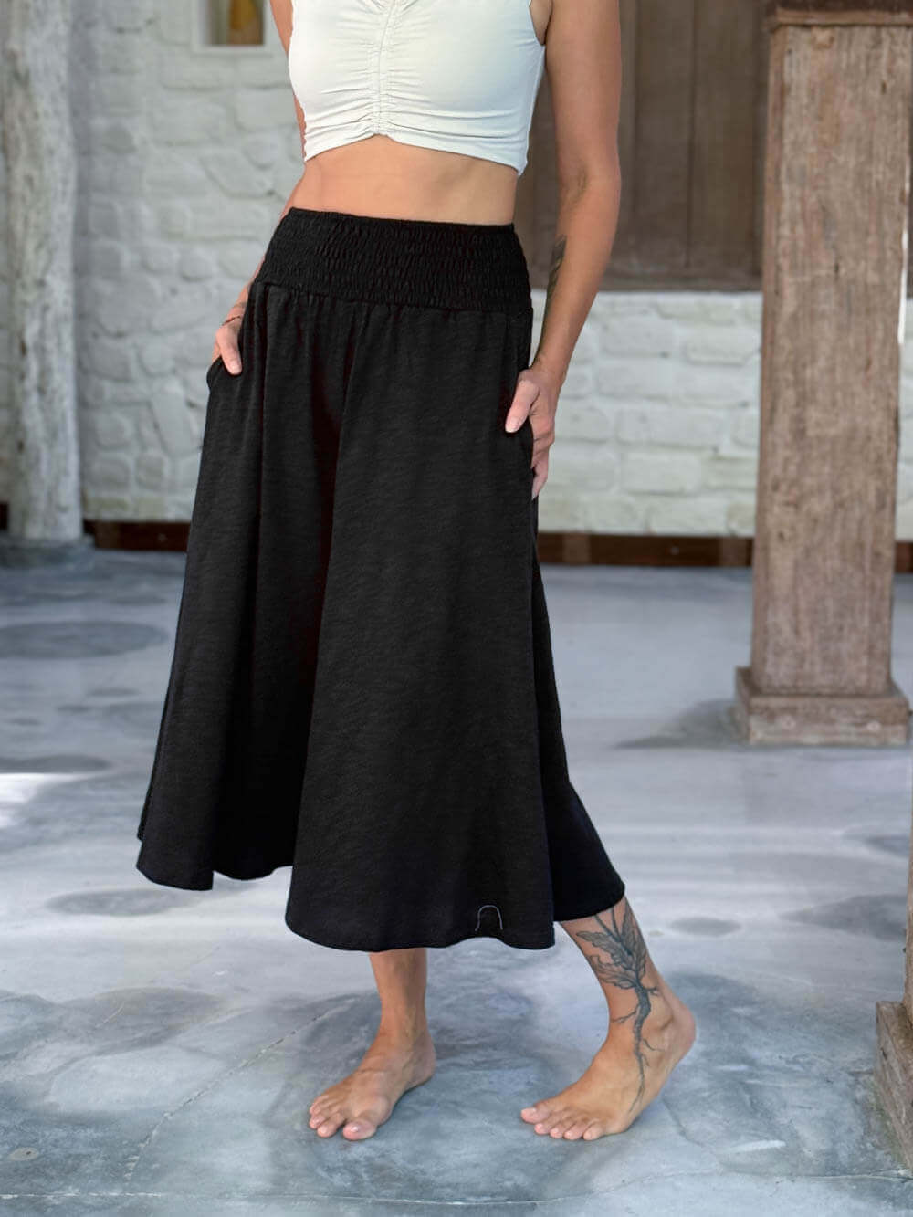 caraucci wide leg flare black cotton culotte pants with pockets #color_black