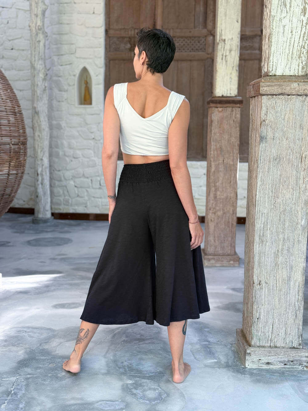 caraucci wide leg flare black cotton culotte pants with pockets #color_black
