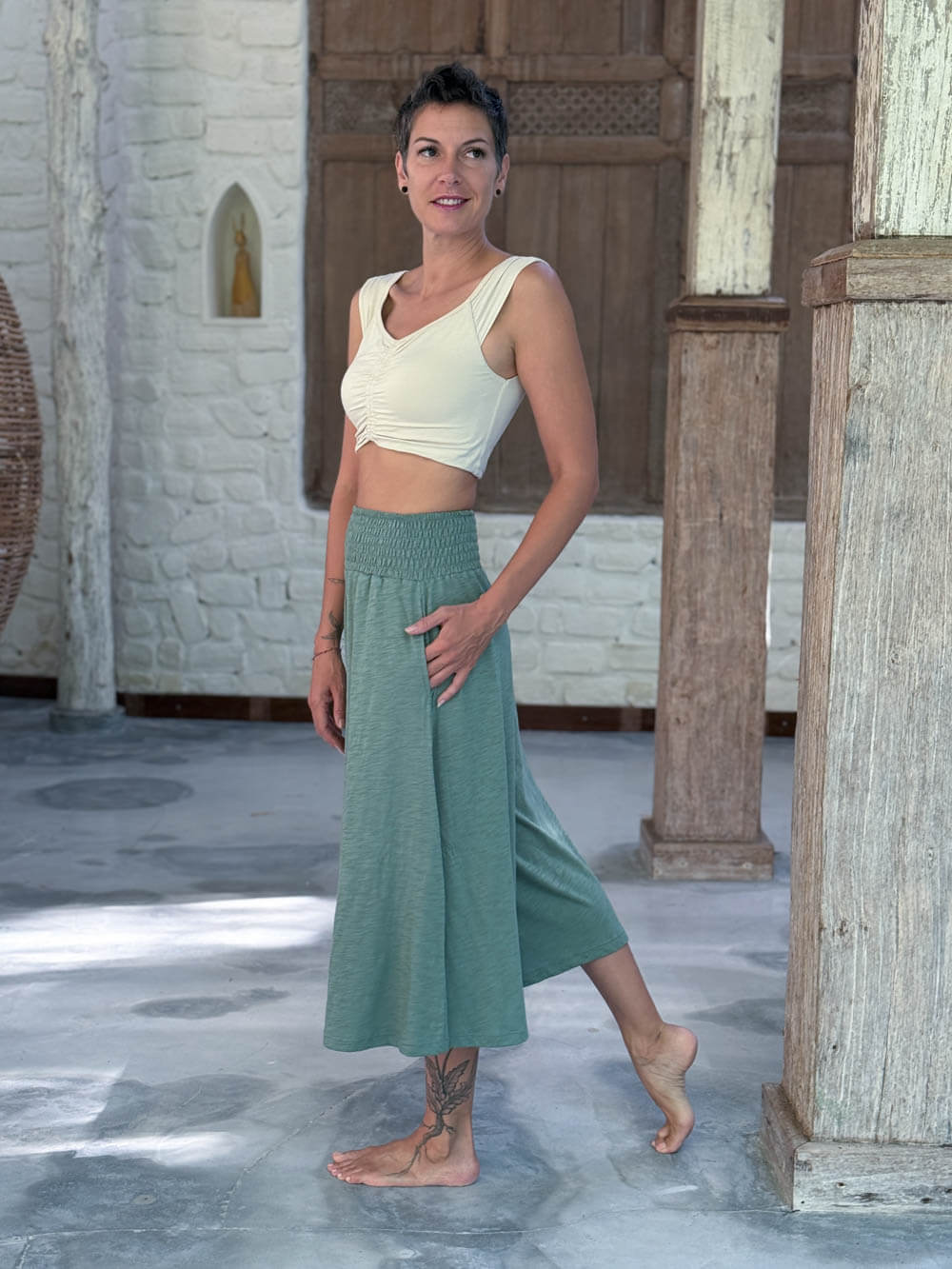caraucci wide leg flare sage green cotton culotte pants with pockets #color_matcha
