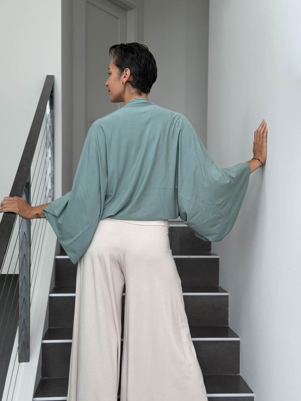 caraucci convertible moss green draped shrug that converts into a cowl neck backless tunic #color_moss