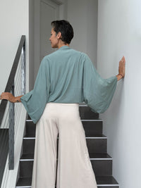 caraucci convertible moss green draped shrug that converts into a cowl neck backless tunic #color_moss