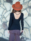 women's long sleeve plant-based rayon jersey top with deep twist v-neck #color_black