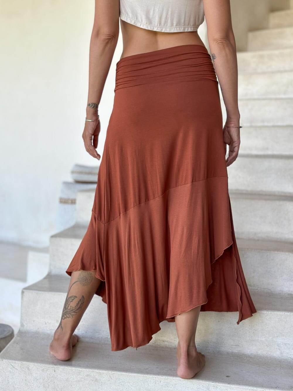 caraucci plant-based stretchy jersey pull-on convertible orange asymmetrical midi skirt #color_copper