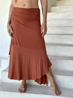 caraucci plant-based stretchy jersey pull-on convertible orange asymmetrical midi skirt #color_copper