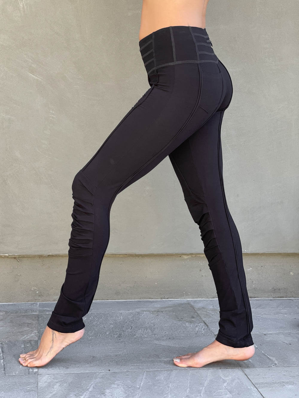 women's bamboo spandex pants with raised stitch details and 2 zipper pockets #color_black